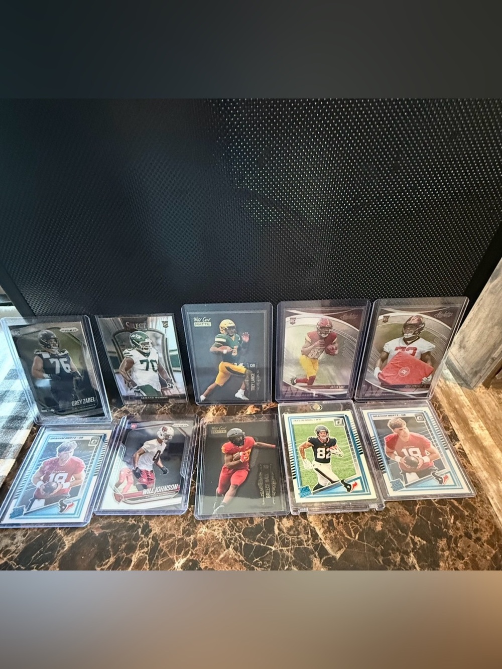 Assorted Football Trading Card Lot
- Multi Color